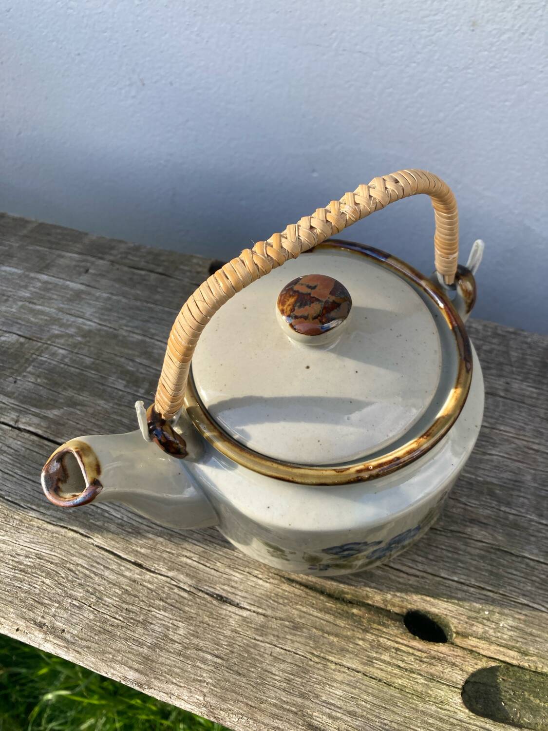 Chinese ceramic and rattan teapot