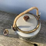 Chinese ceramic and rattan teapot