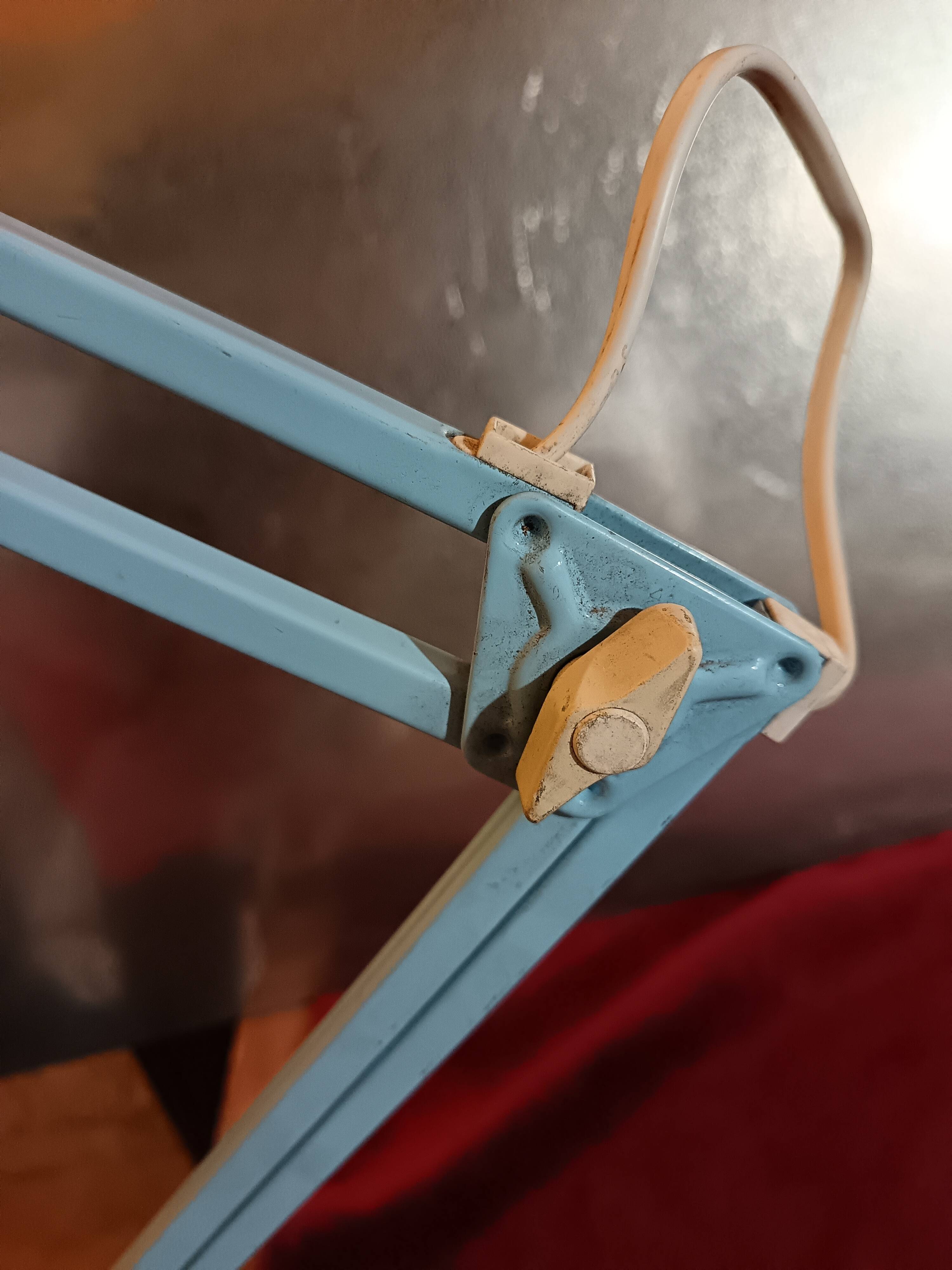 Articulated blue desk lamp