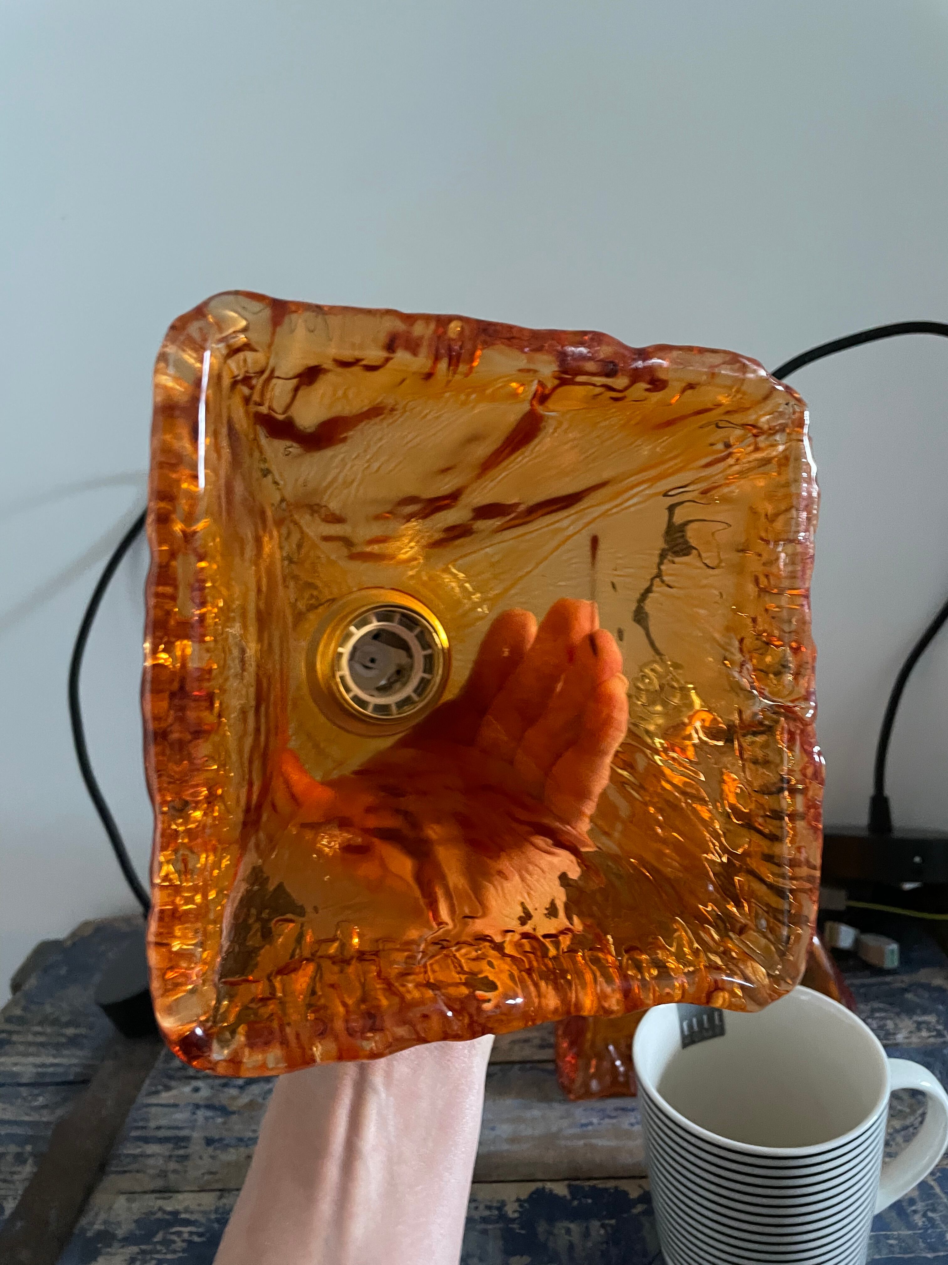 Set of two amber glass hanging lamps