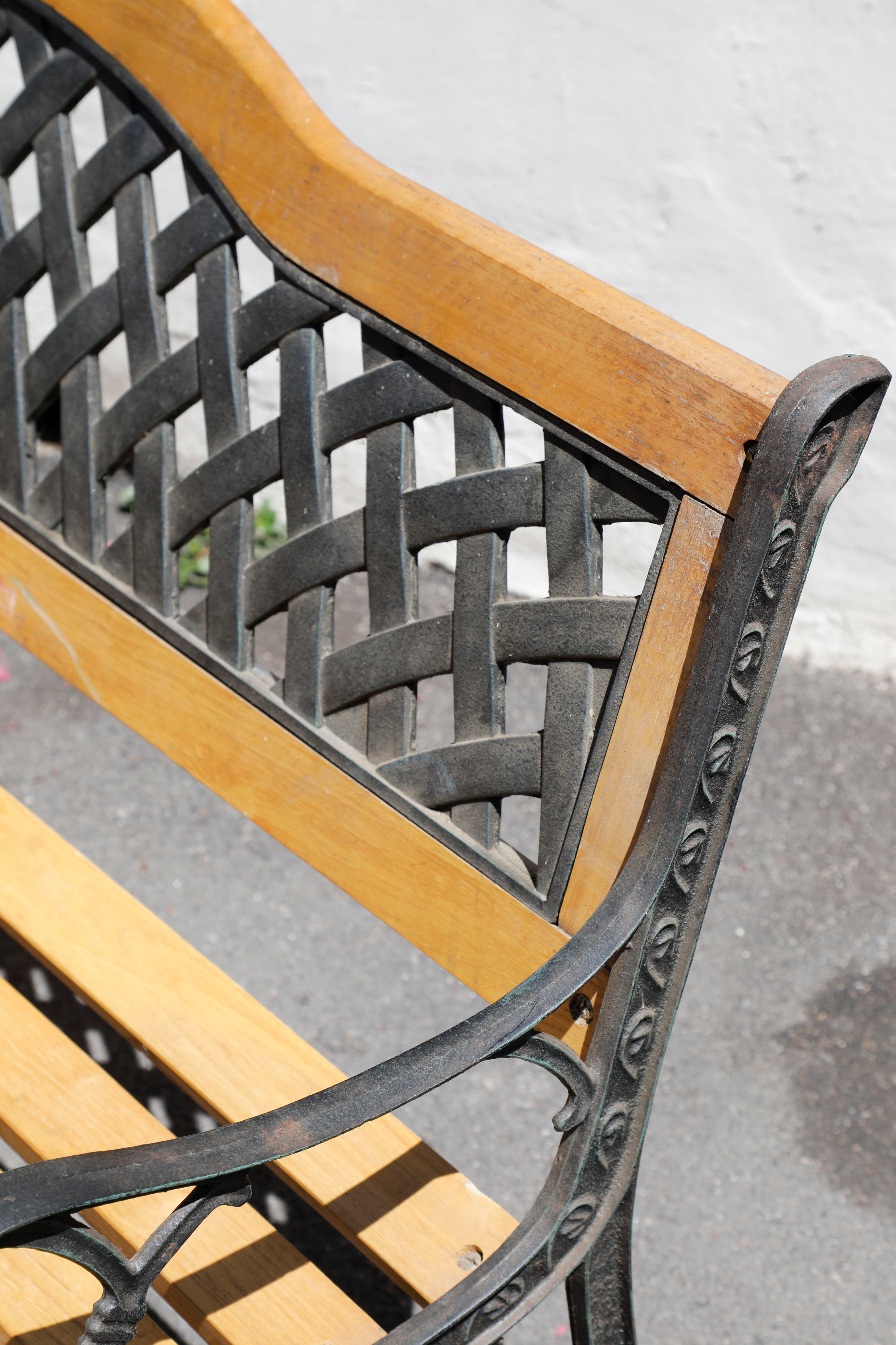 Wood and cast iron garden bench