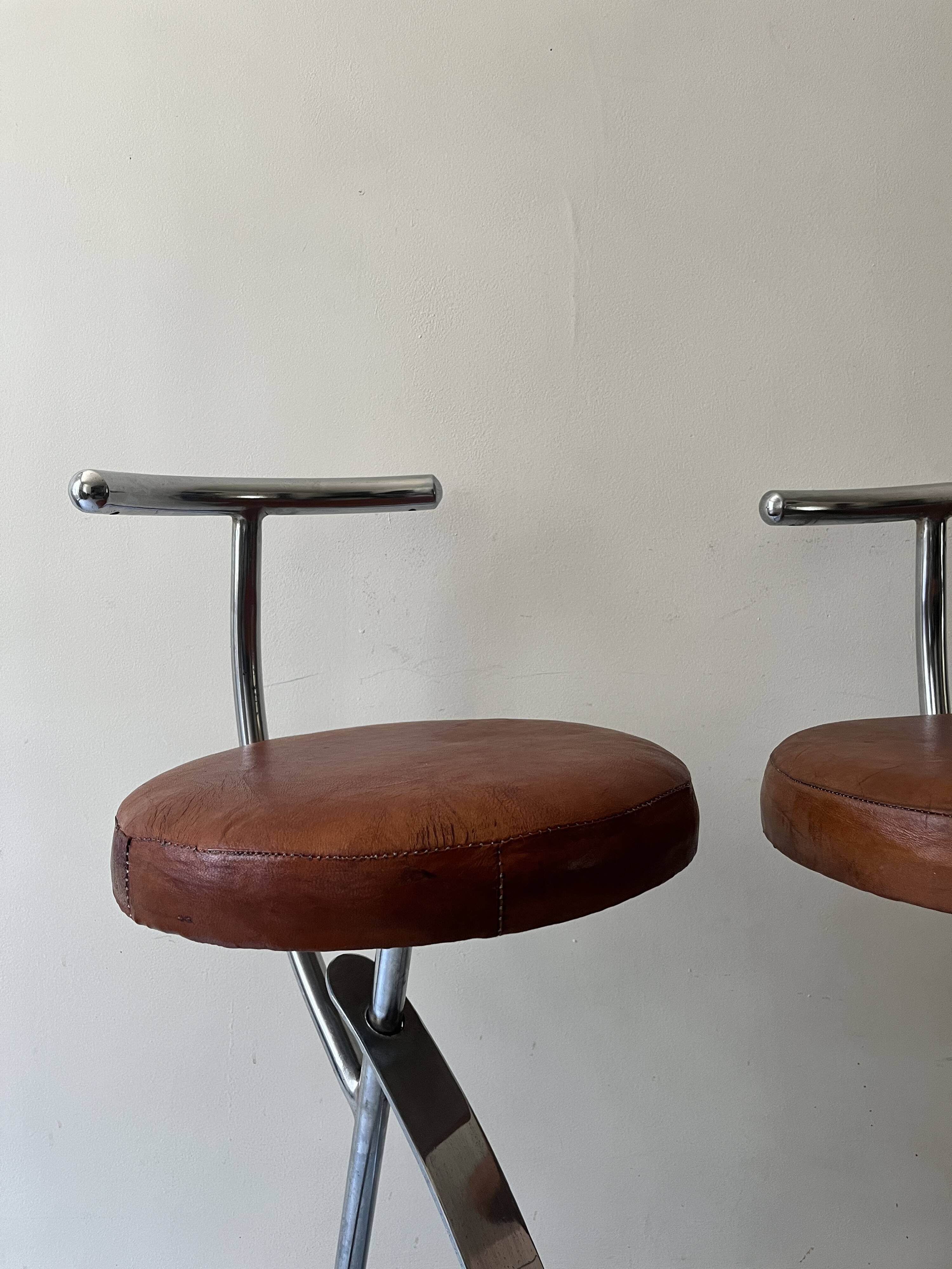 Bar stools in tubular chrome and tan leather, 1970s