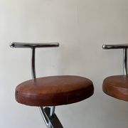 Bar stools in tubular chrome and tan leather, 1970s