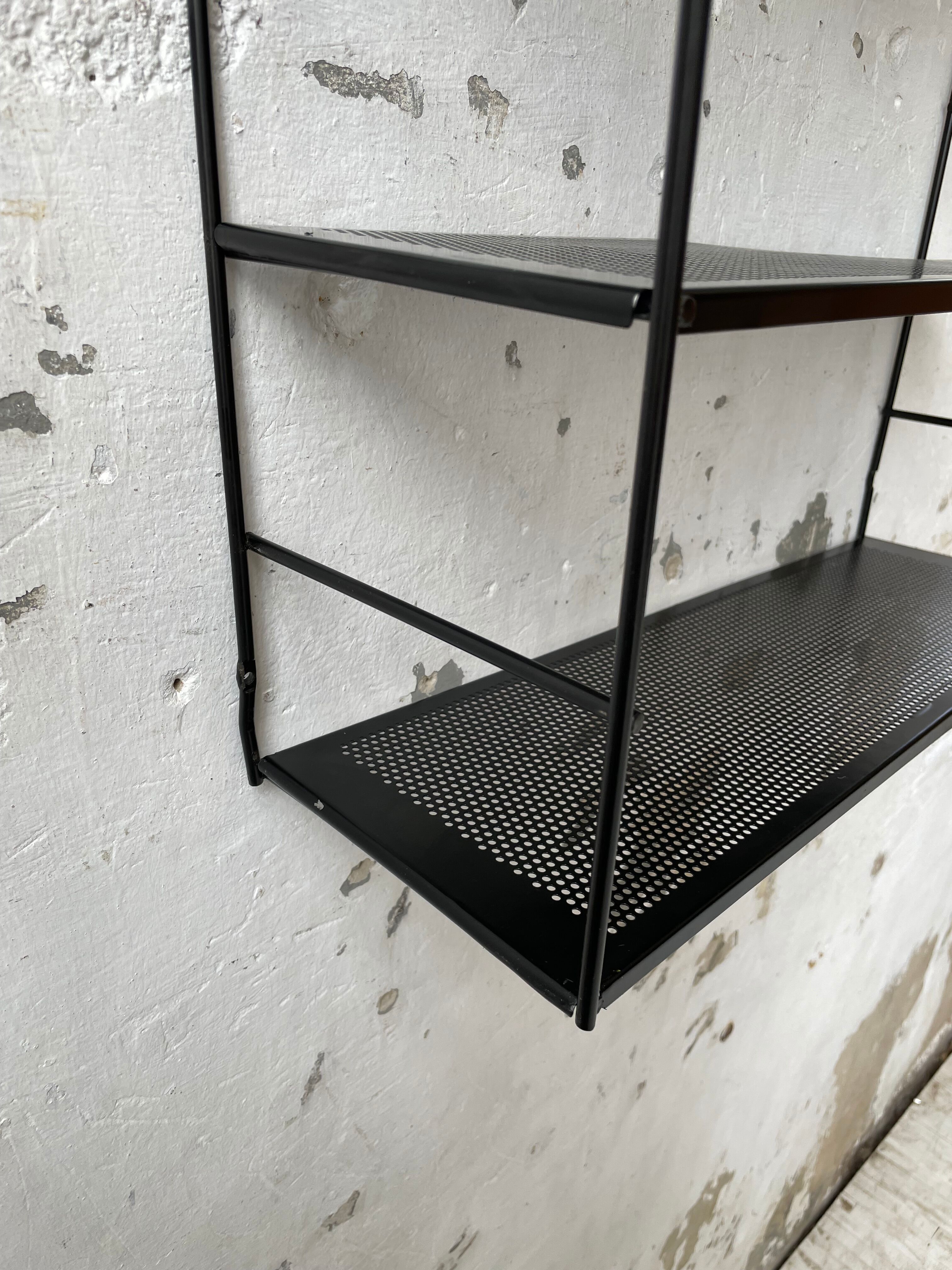 Black metal string shelf