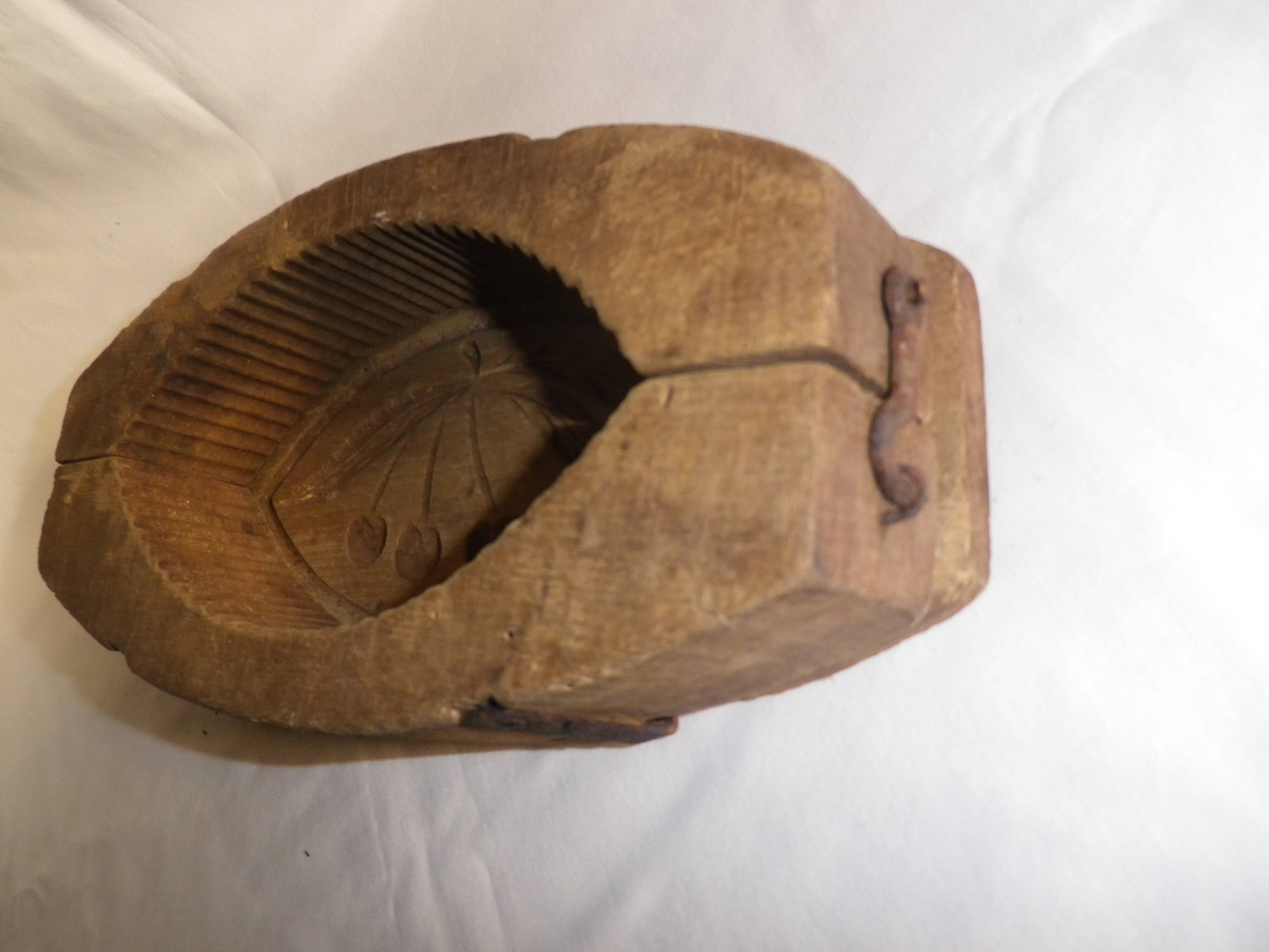 old wooden butter mold