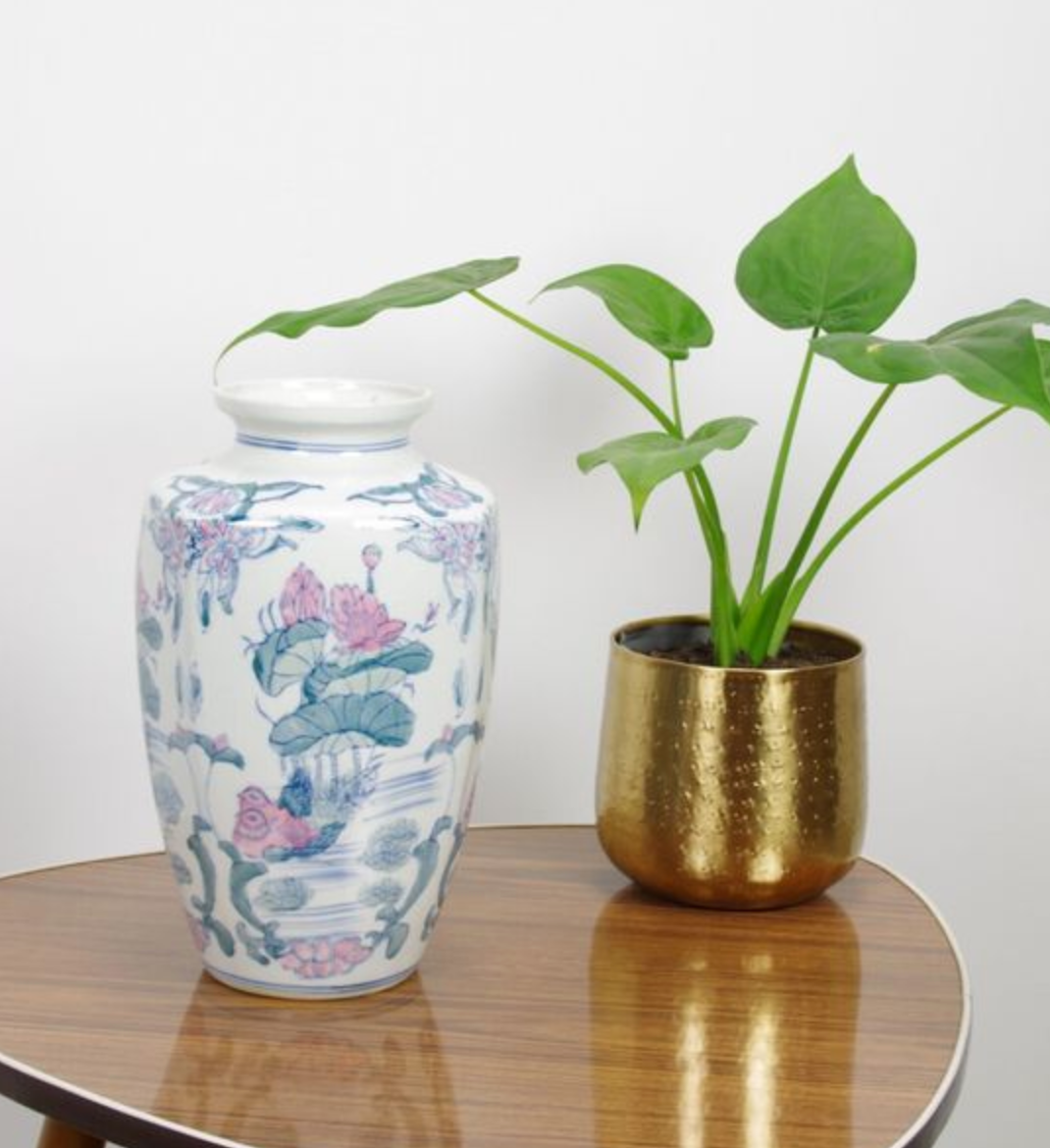 Vintage porcelain vase with pink flowers