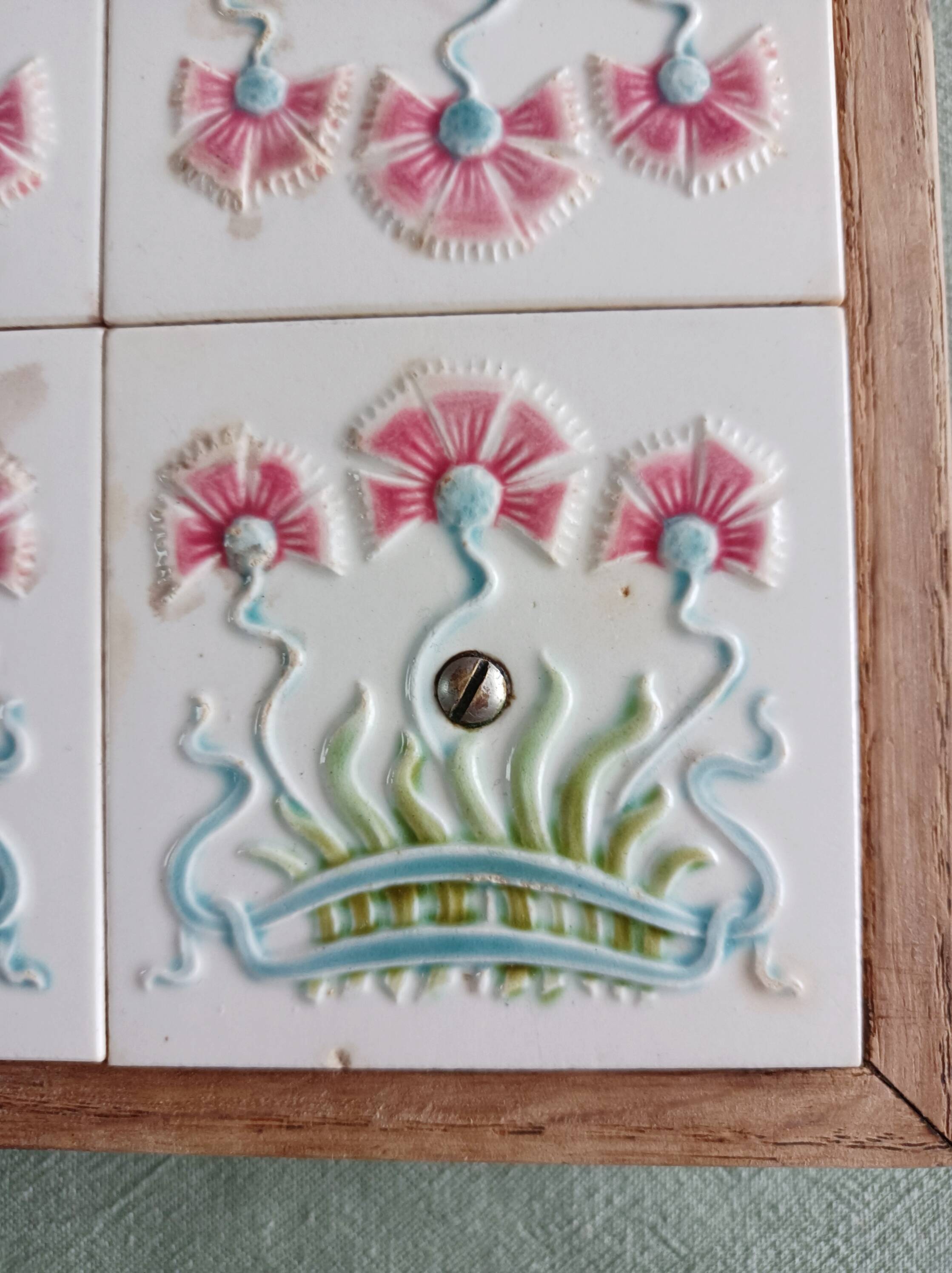 Antique earthenware and wood trivet