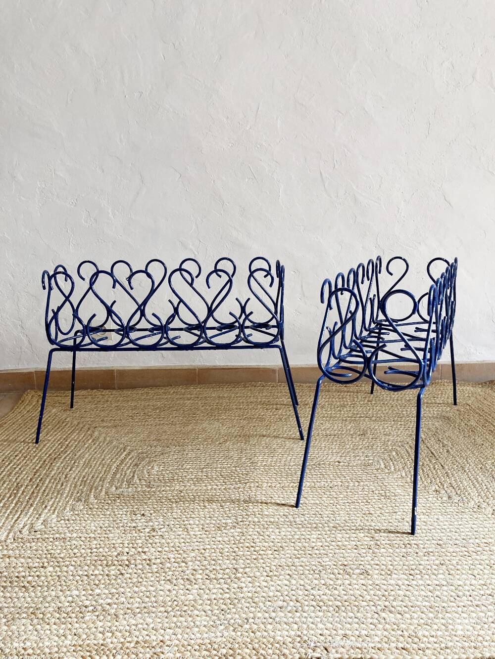 Pair of blue-painted wrought iron planters, 1960s