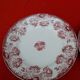2 assiettes en faïence sté amandinoise terre de fer modèle oeillets diam 23 cm