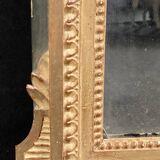 Louis XVI style mirror in gilded wood