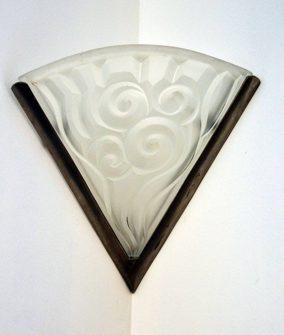 Pair of angular art deco wall sconces with silver metal frames