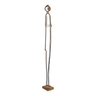 Metal Sculpture of a Standing Figure