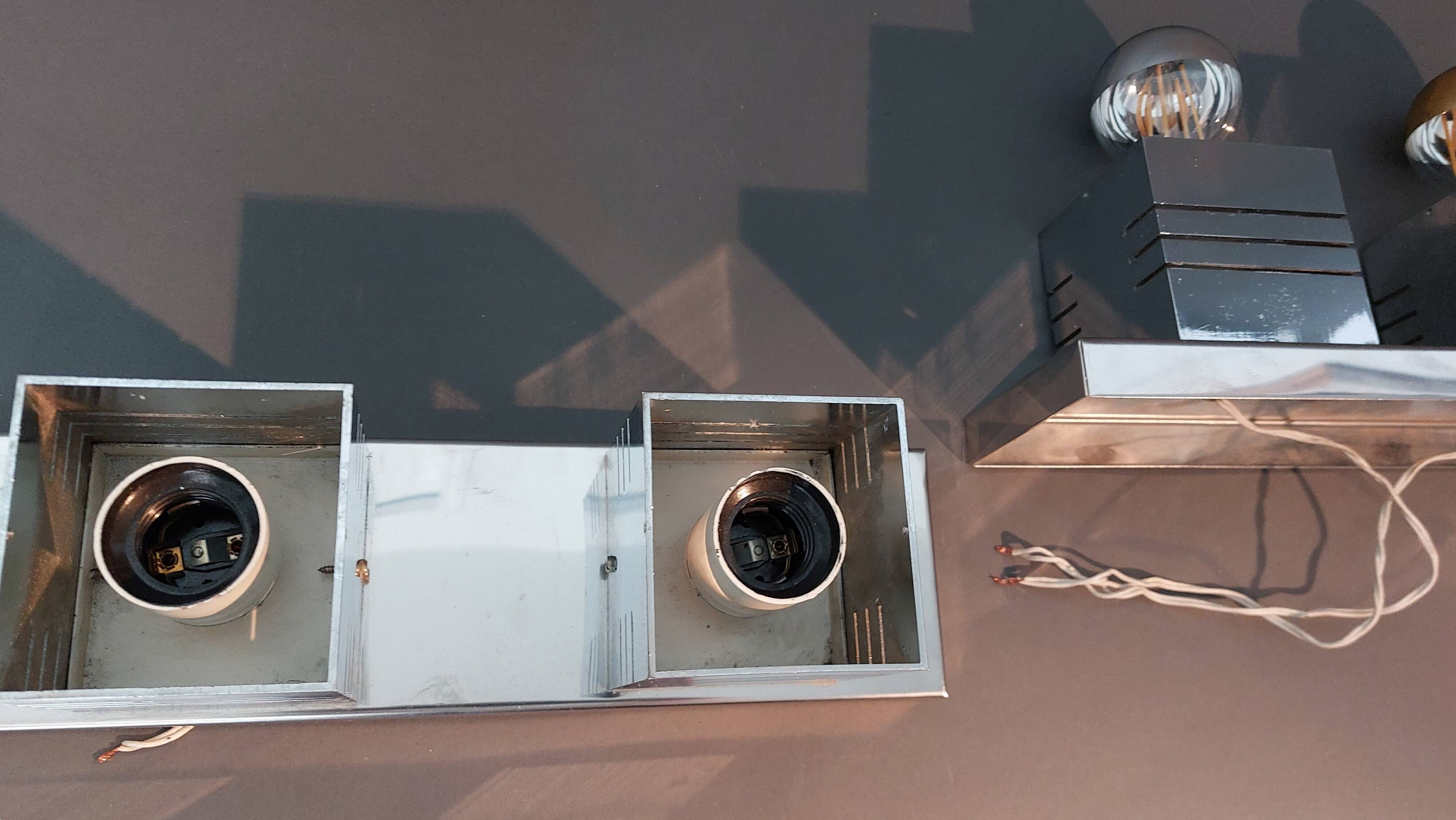 Pair of Spage Age 1970 chrome wall lights.