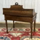 Louis XVI style desk from the late 19th century in walnut with a leather top.