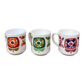 Three Mobil cups
