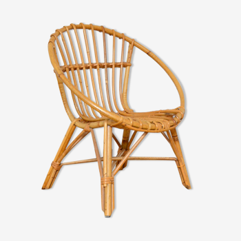 Children's shell armchair in rattan 1960s