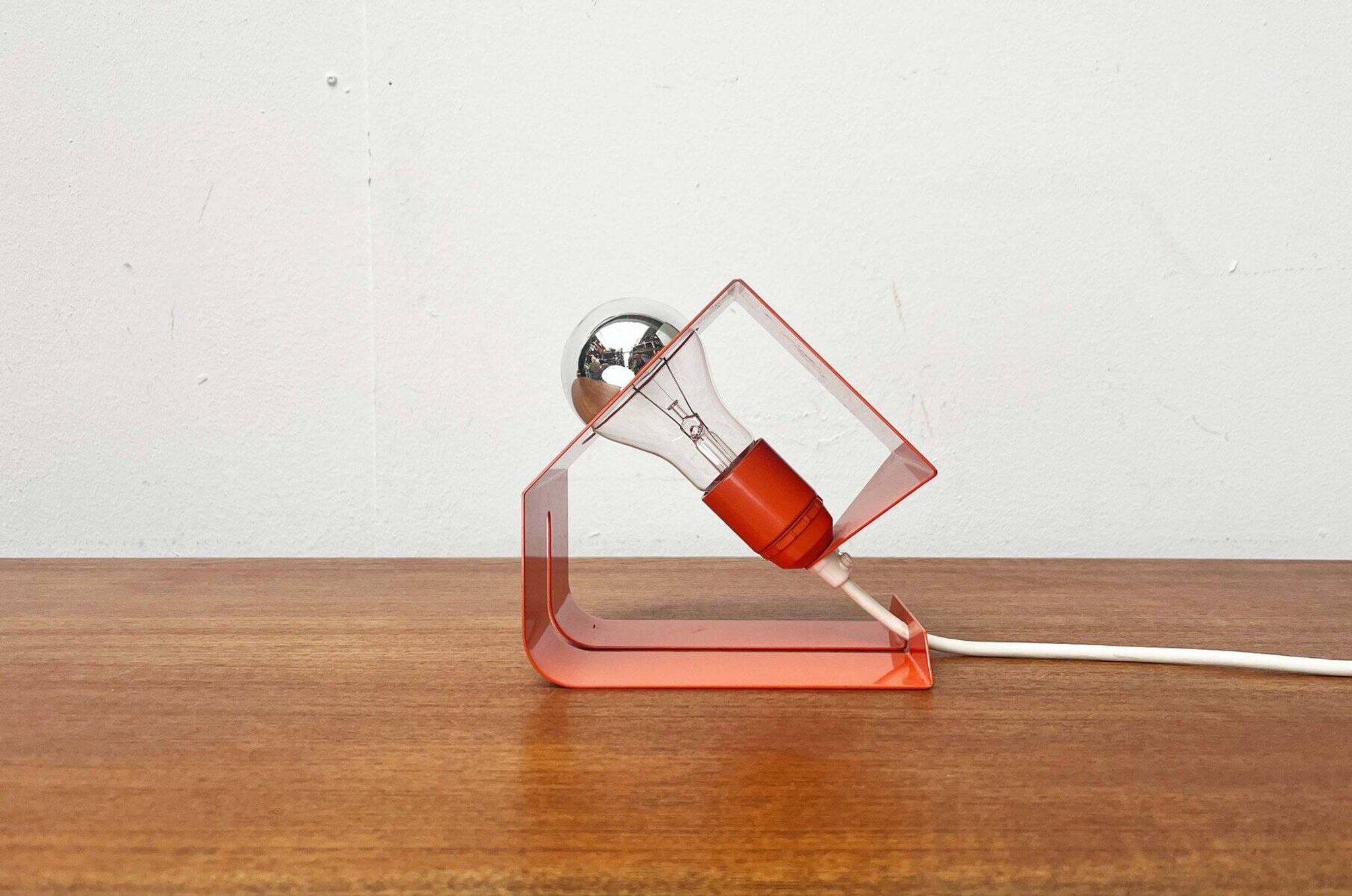 Orange metal table lamp, minimalist, modern mid-century space age, 1960s.