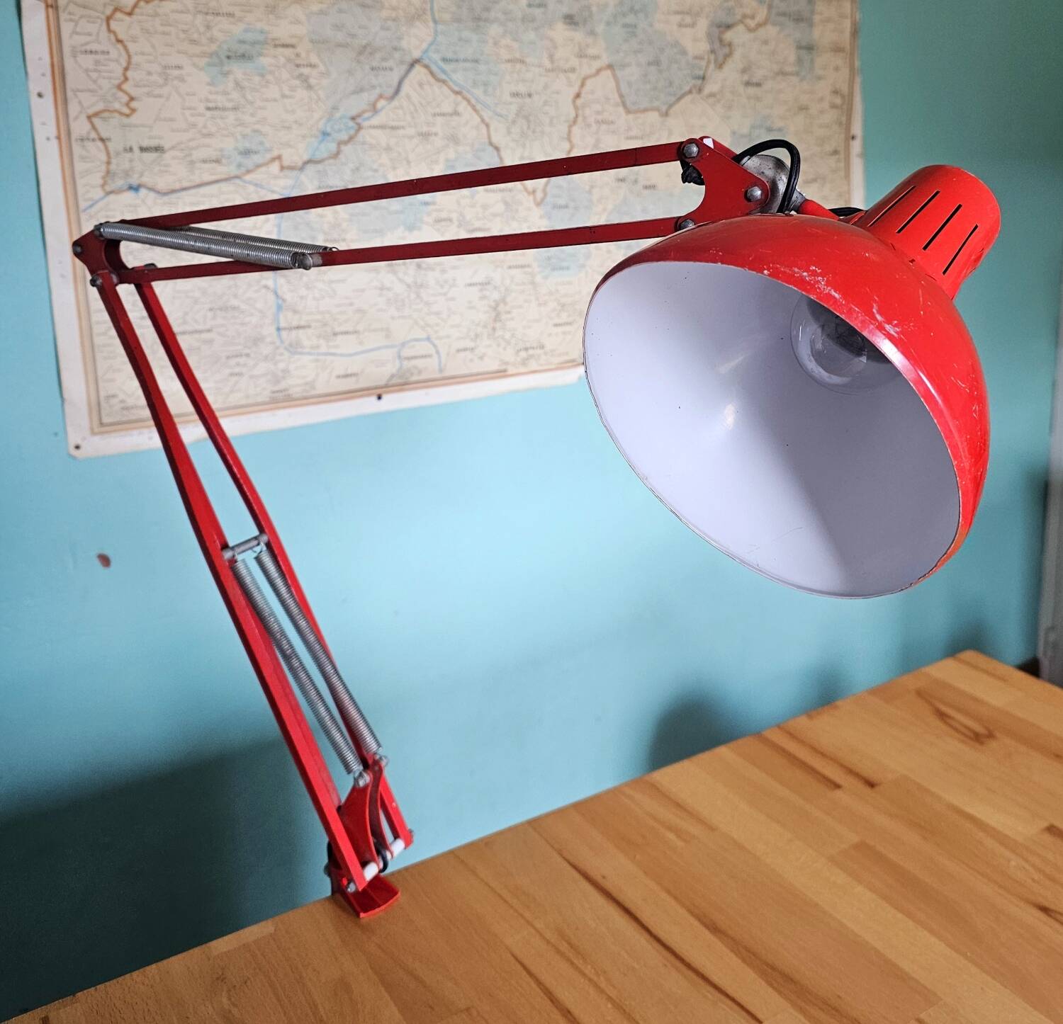 Red articulated workshop lamp