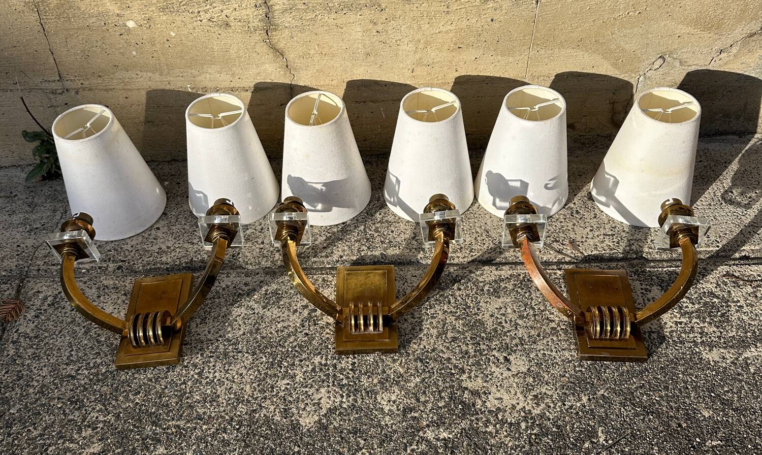Antique Art Deco wall sconces attributed to Jacques Adnet.
