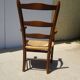 Fauteuil traditionnel en bois et paille