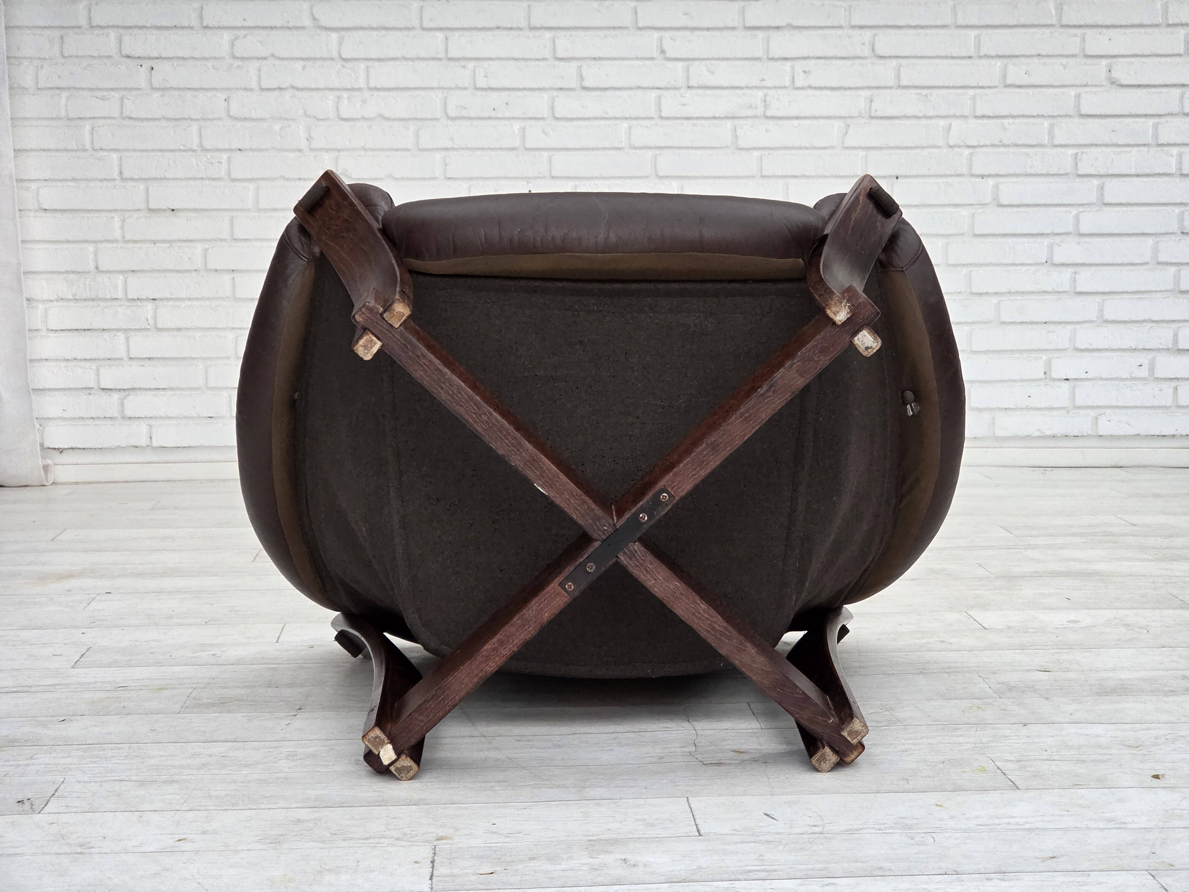 1970s, Scandinavian lounge chair, furniture leather, oak wood.