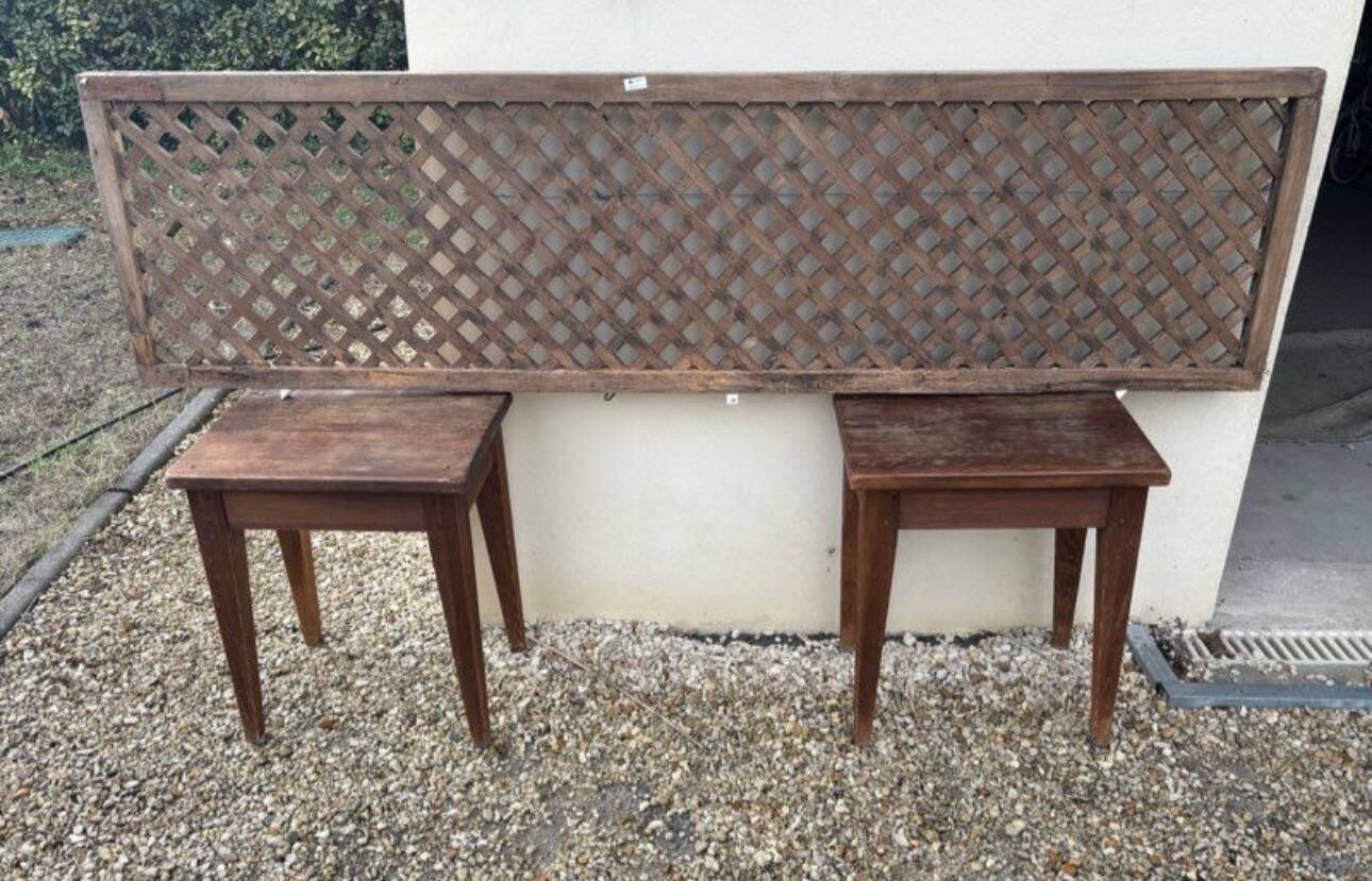 Headboard and its two wooden bedside tables.