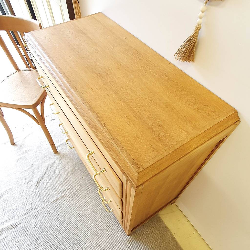 Oak compass foot chest of drawers