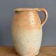 Large earthen pot or jug turned