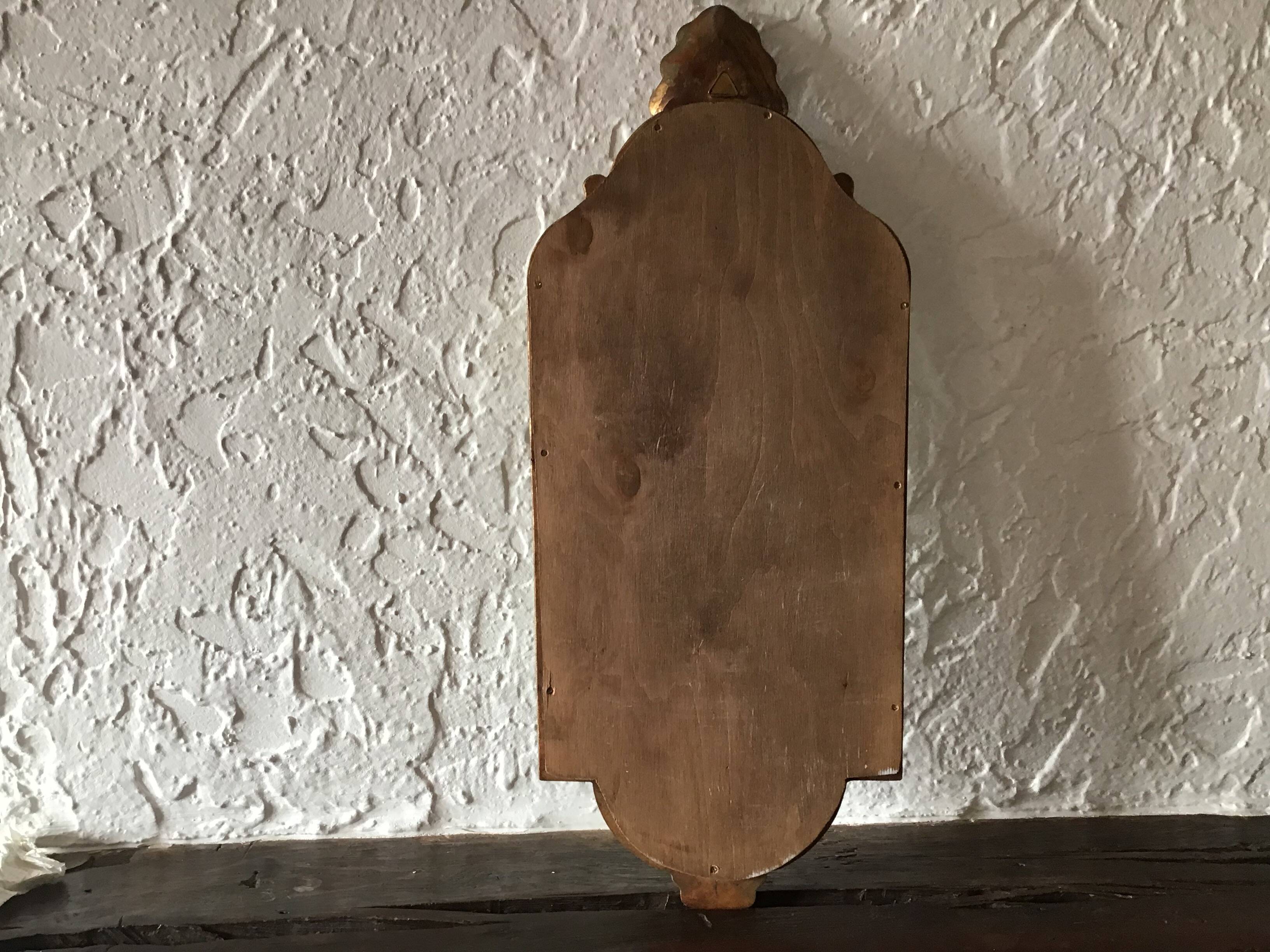 Old gilded wood mirror