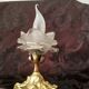 Art nouveau lamp in gilded bronze with glass tulip