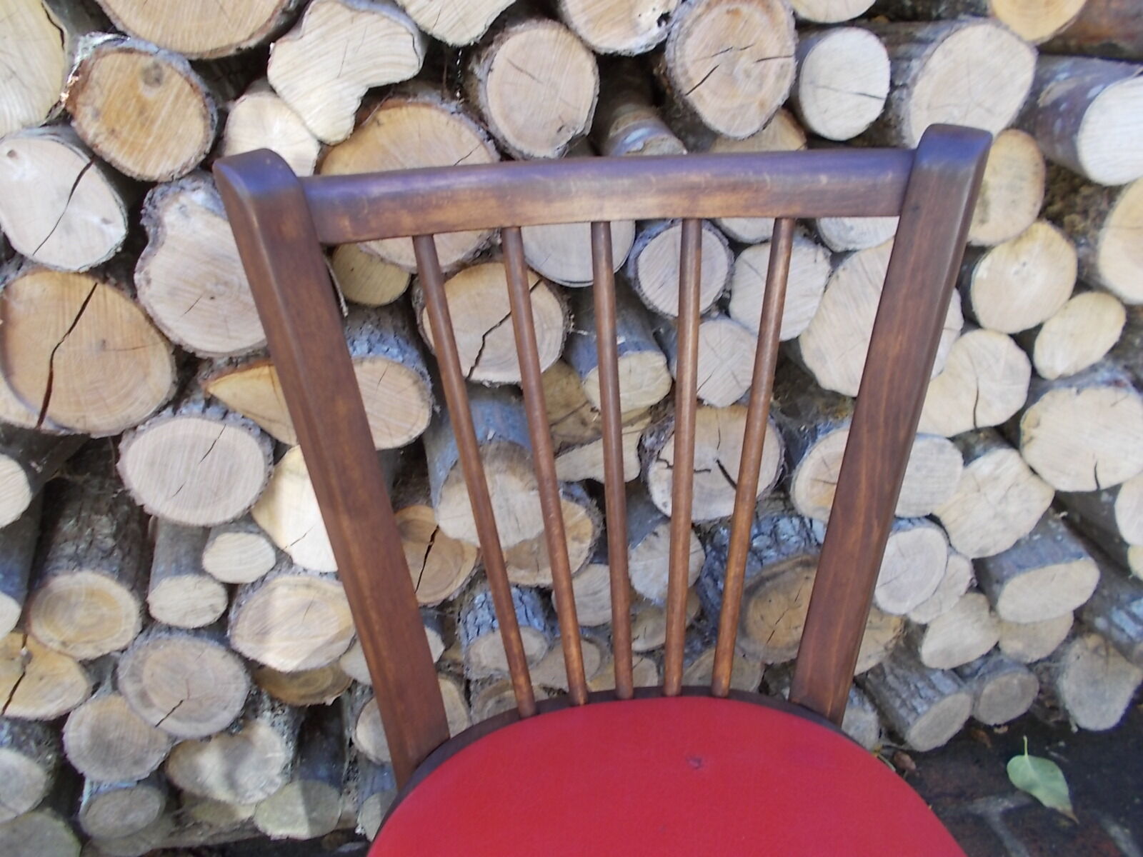 Vintage bistro chair sitting red