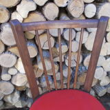 Vintage bistro chair sitting red