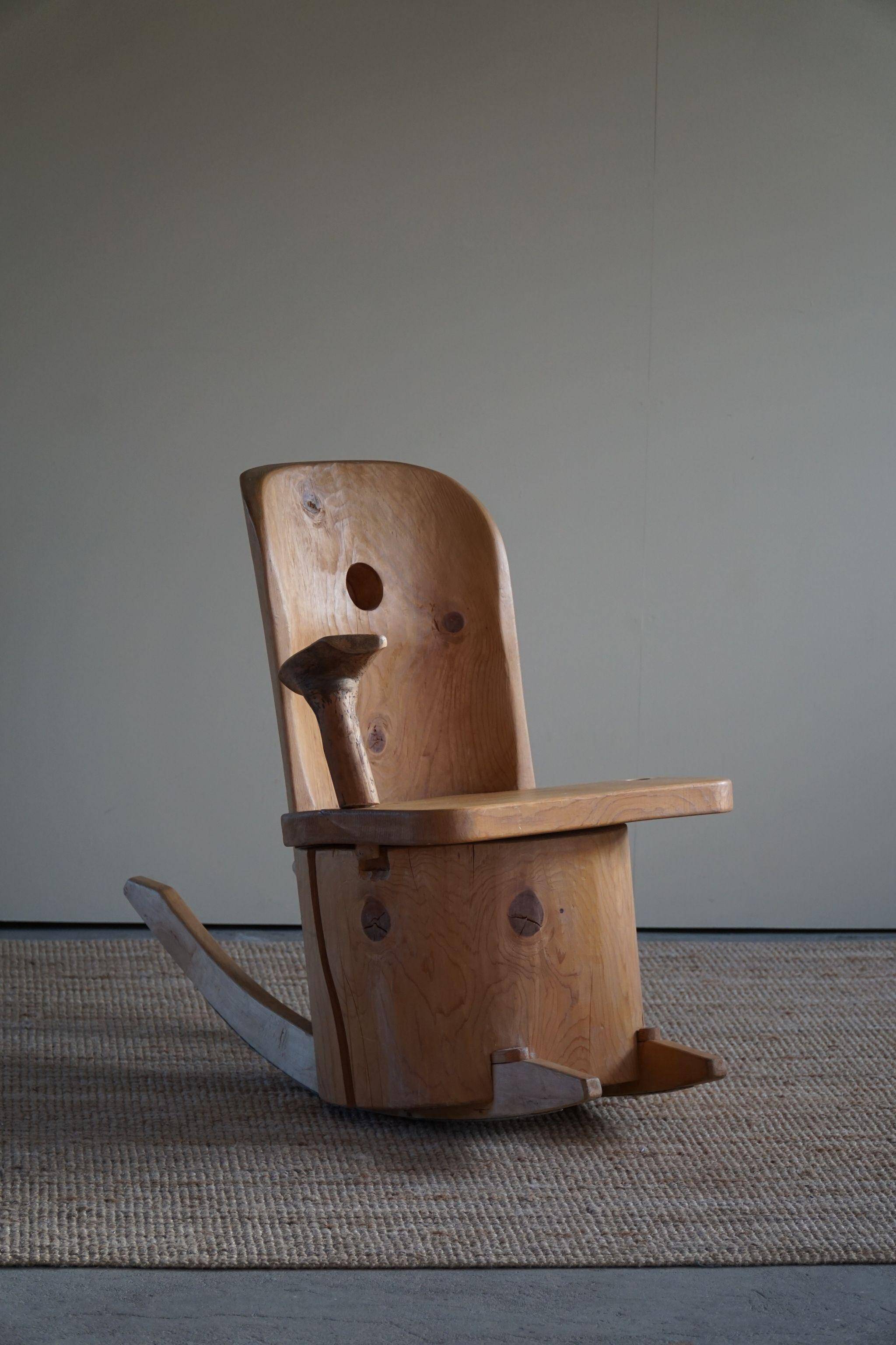 Unique sculptural rocking chair by the Finnish Matti Martikka in solid pine, 1960s.