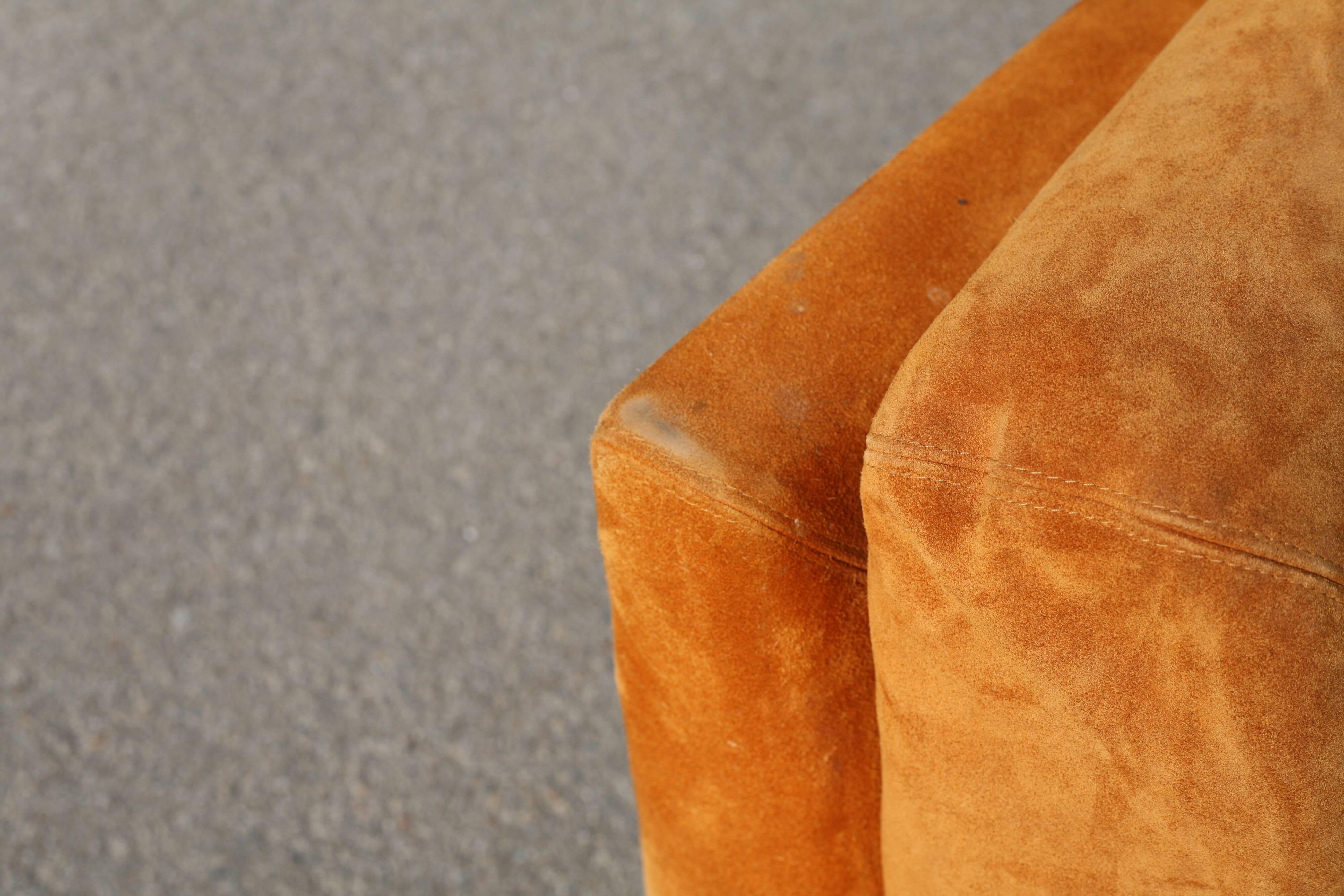 Orange suede leather and steel sofa. Circa 1970