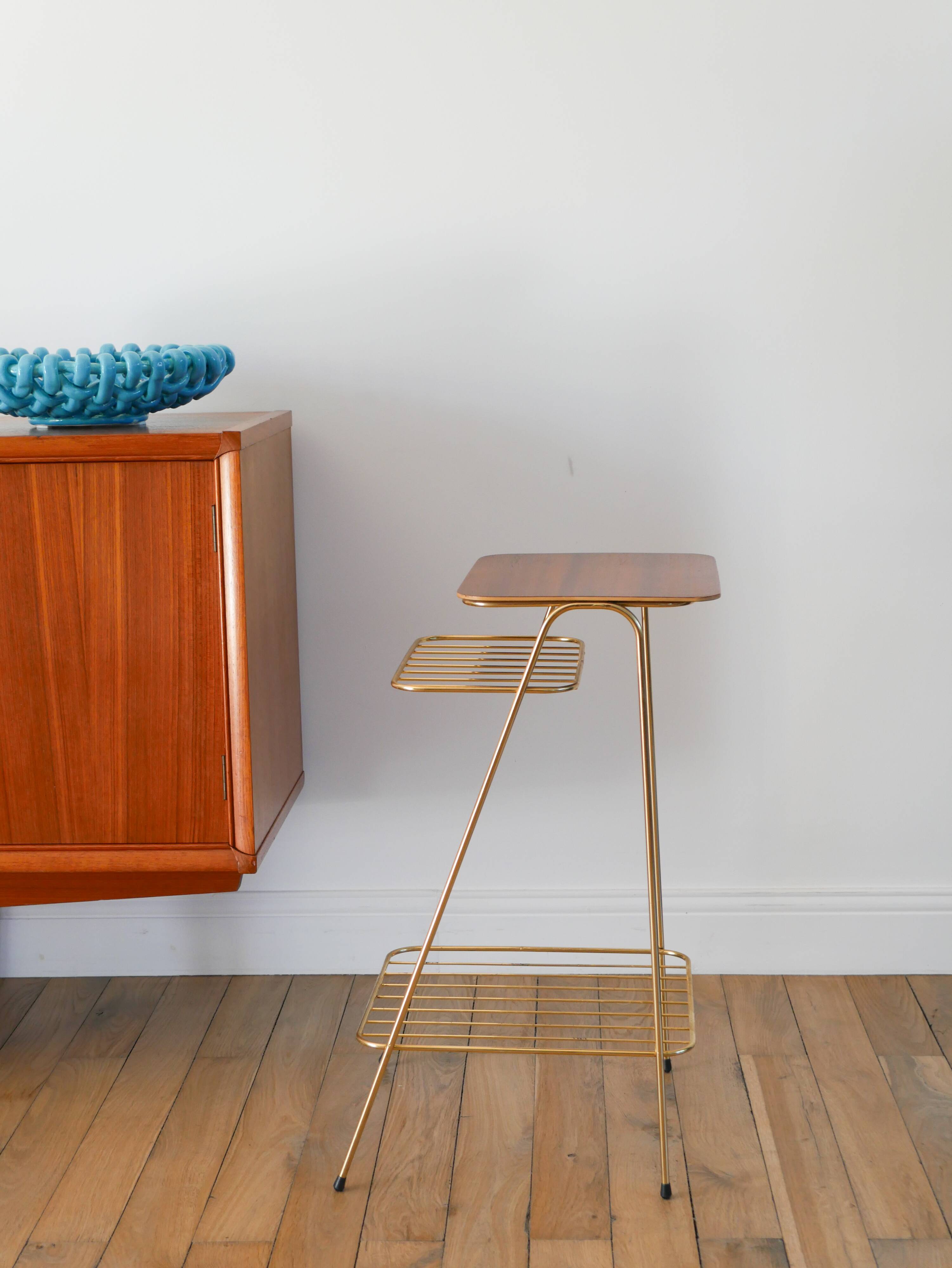 Small brass side table with a teak top, 1960.