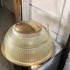 Gold holophane wall light