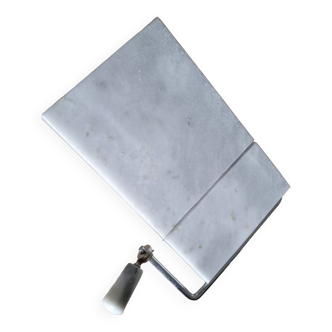 Marble tray cutting cheese or foie gras
