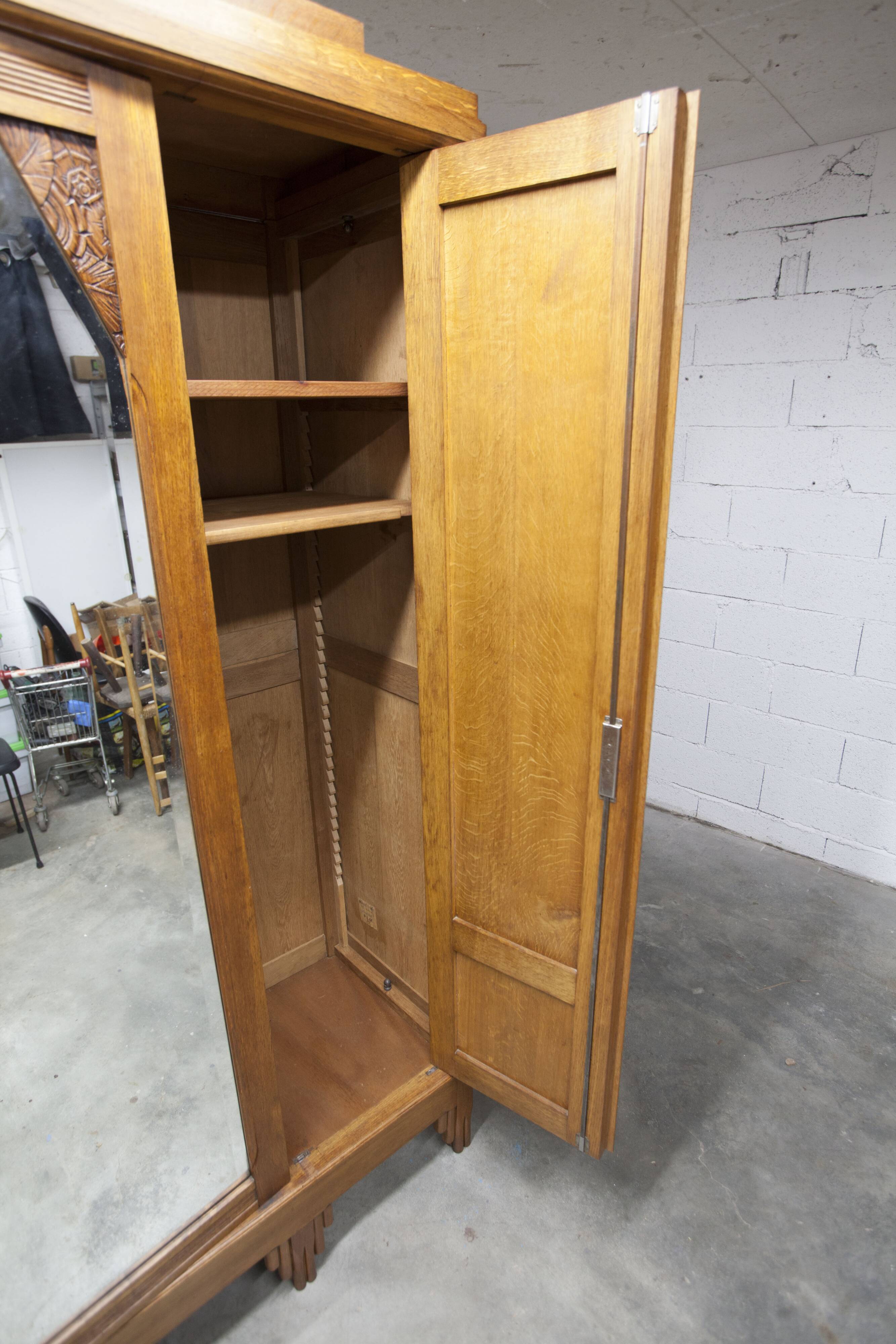 Art Deco carved oak wardrobe - Flemish workshop circa 1930
