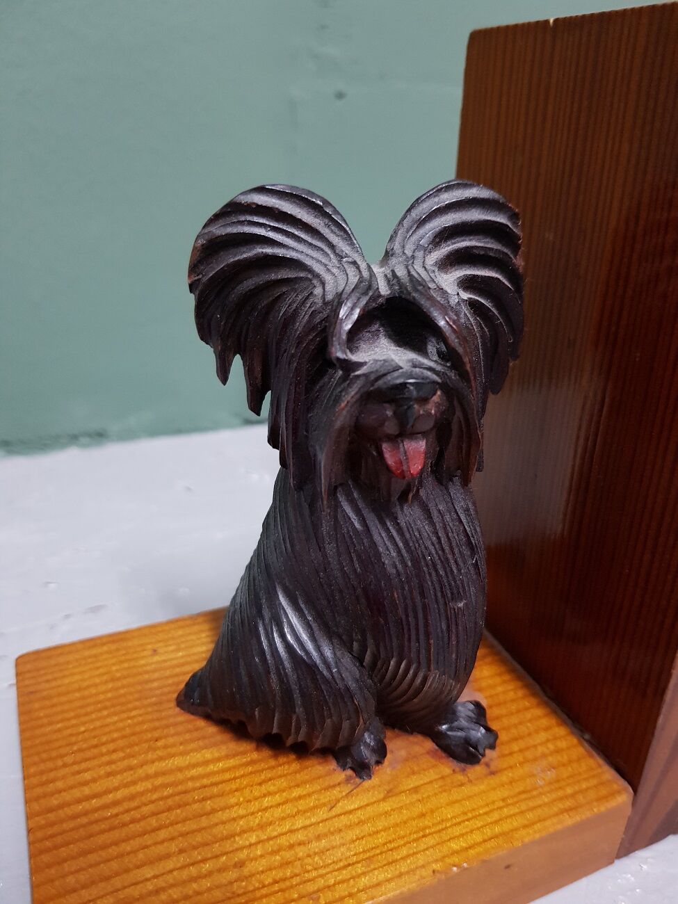 Mid 20th century wooden bookends with carved sitting dogs