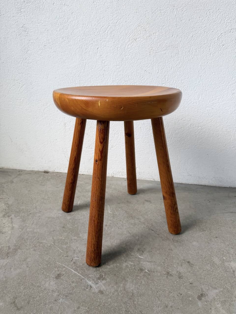 Pine stool assigned to Charlotte Perriand for Les Arcs.