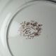 Antique Longchamp shallow dish with polychrome daisies in ironstone.