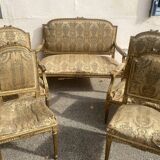 Louis XVI style living room in gilded wood. Napoleon III period