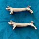 10 animal-shaped knife holders in silver-colored metal