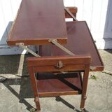 A rolling table with a removable tray