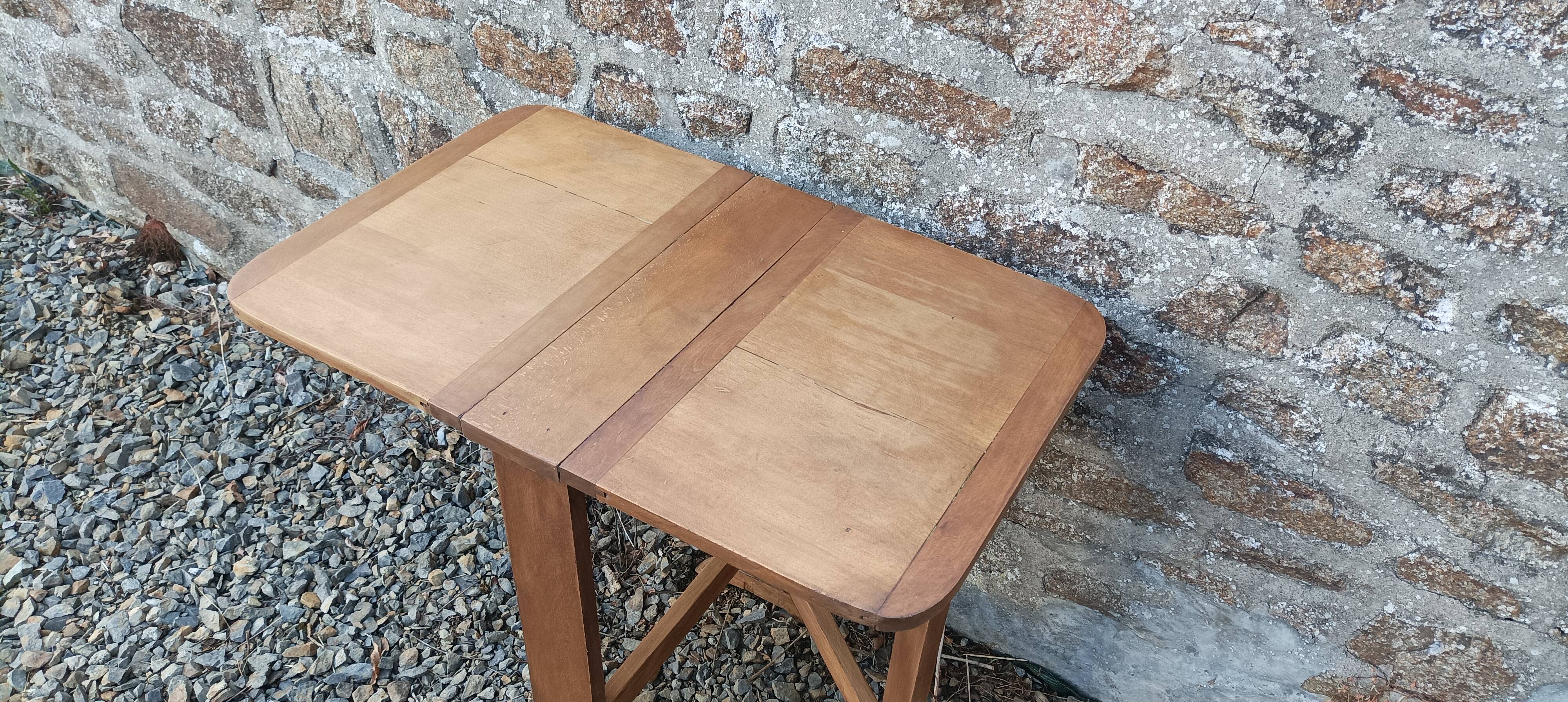 Old wooden table with double swings