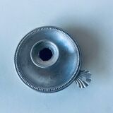 Old aluminum candle holder
