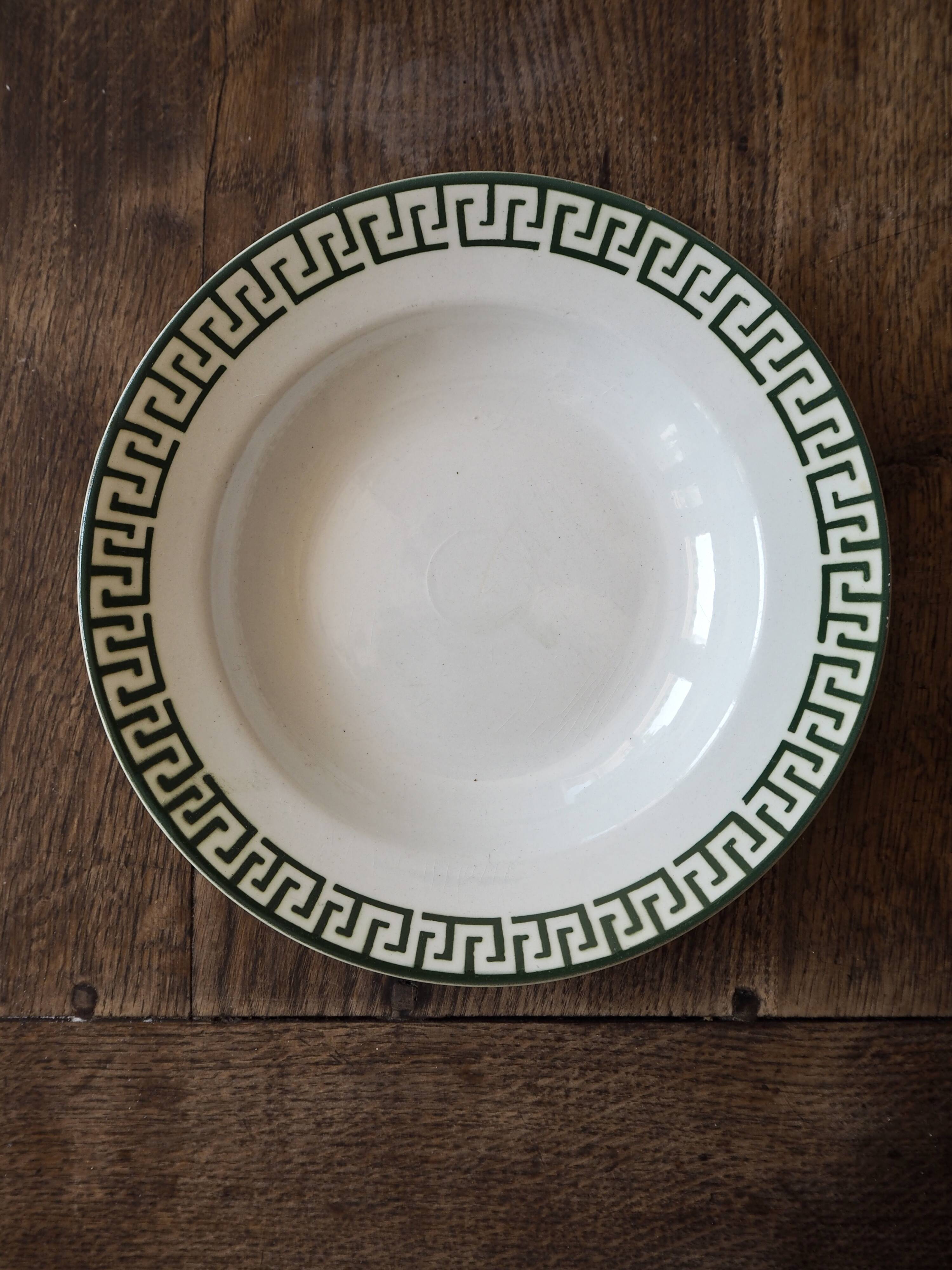 Set of 12 green patterned soup plates, Badonviller earthenware