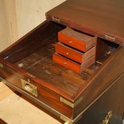 Victorian antique leather Davenport campaign desk with brass gallery.
