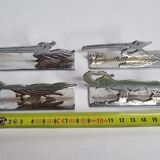 Set of four art deco knife holders after Benjamin Rabier, 1930