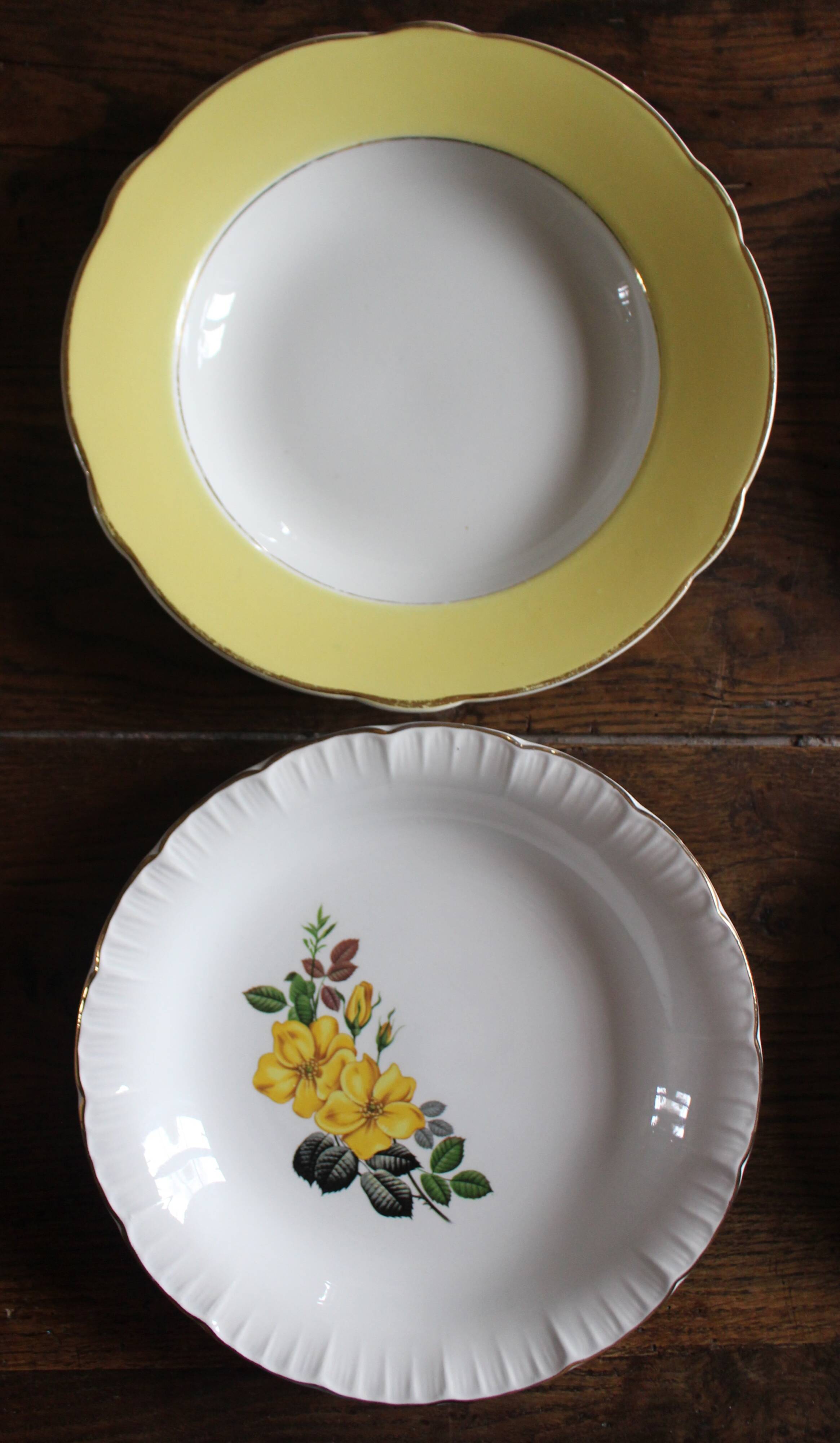6 mismatched deep plates in floral colours from Digoin, Sarreguemines, Gien.